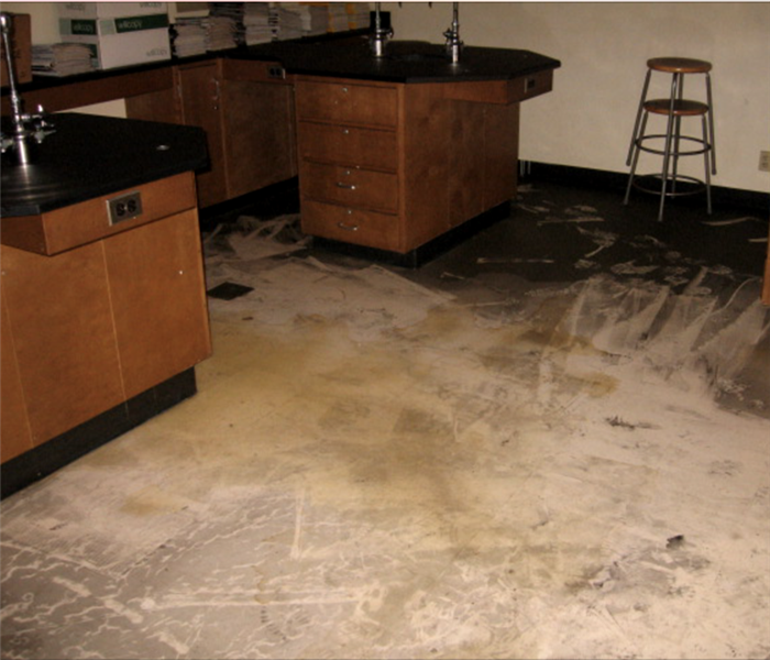 Fire damage in a school lab room.